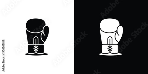 Two boxing gloves on black and white background black glove
