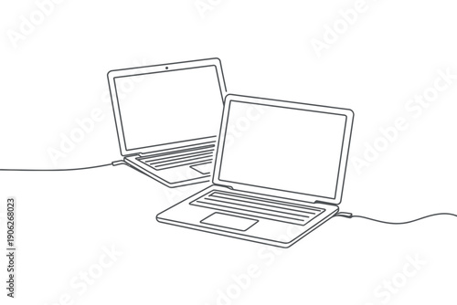 Two laptops connected with a cable on a white background