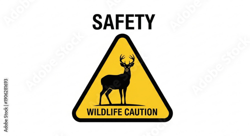 Yellow triangular wildlife caution sign with black deer silhouette and safety warning on white background alerting to potential animal hazards