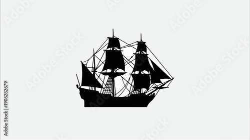 Silhouette of a majestic sailing ship against a bright background.