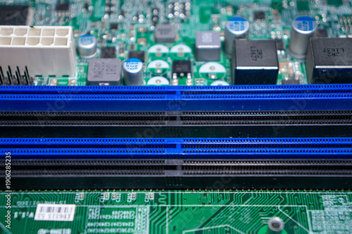 Fotografie A close-up of part of the motherboard and memory slots