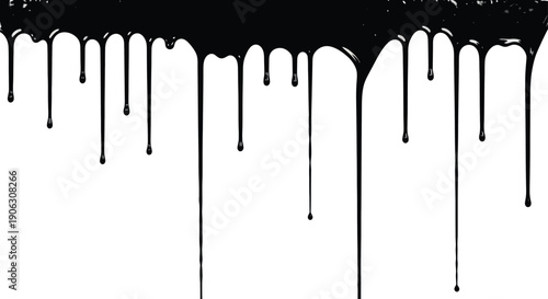 Black paint dripping down a white wall