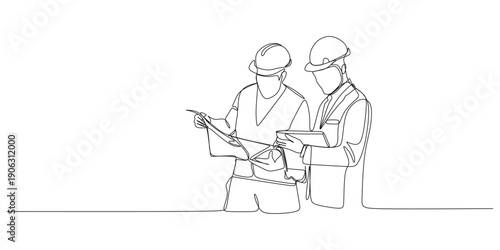 The architect and construction foreman are checking the design plans