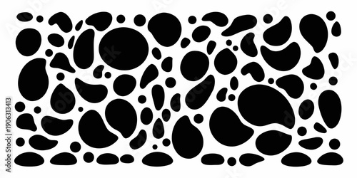 Abstract arrangement of irregular black shapes on a white background