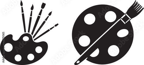 Art supplies: a painter's palette with brushes and a separate palette with paint blobs.