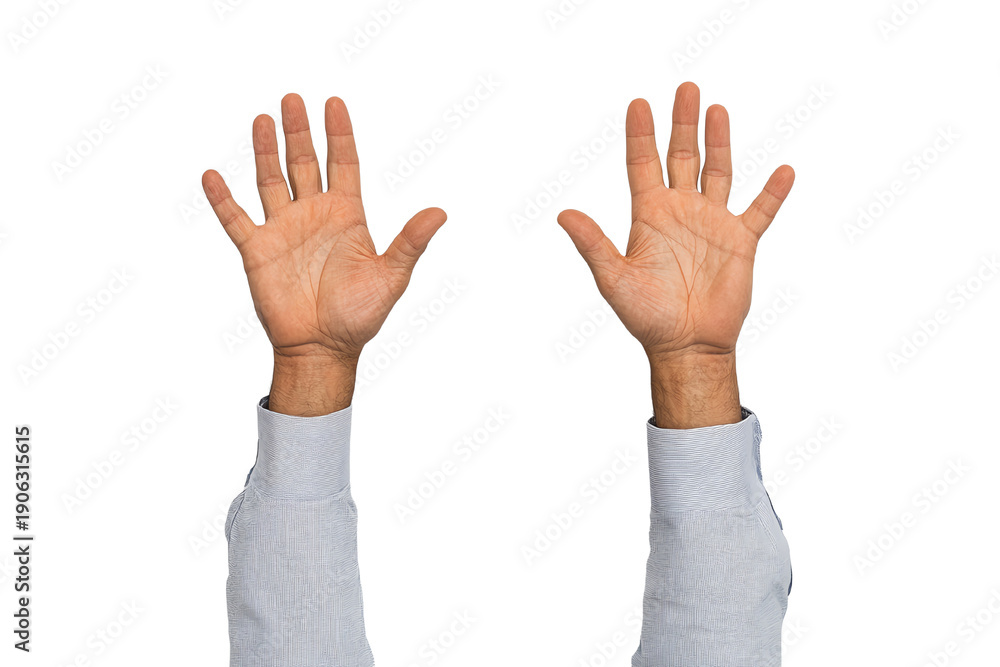 Obraz premium Two hands raised in a gesture of celebration or surrender against a white isolated background.