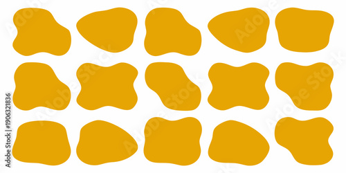 Abstract arrangement of irregular amoeba like golden yellow shapes