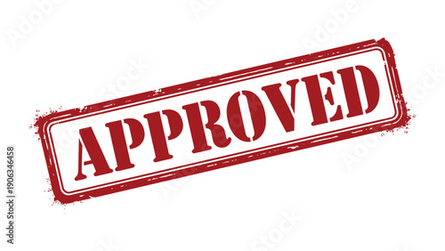Approved Stamp of Authority: A classic red rubber stamp with the word APPROVED imprinted in bold, signaling validation and official sanction.