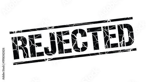 Rejected Stamp: A close-up view of a REJECTED stamp in bold, conveying denial and non-acceptance. The stark design and dark letters convey a sense of finality.
