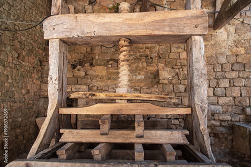 Quadro su tela Old wooden grape press for making wine
