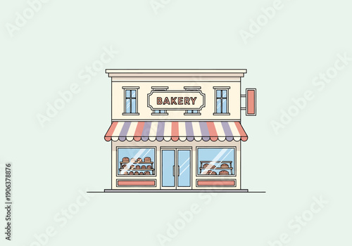 Charming Downtown Bakery Facade With Open Door And Display Windows Showing Fresh Baked Goods And Awning Over Entrance