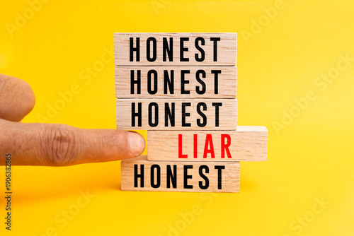 wooden boards with honest and liar words. chosen honestly