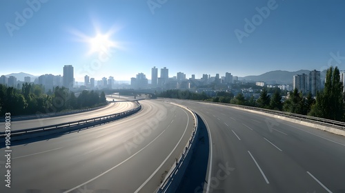 Empty highway with city skyline and bright sun in the background.