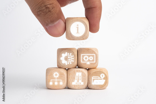 Wooden cubes with ITIL icons representing IT services, processes, and management, showcasing the concept of Information Technology Infrastructure Library.