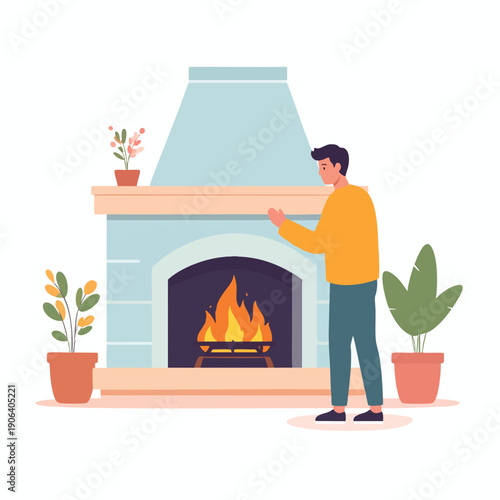 A man standing near a lit fireplace in a cozy indoor setting with plants around
