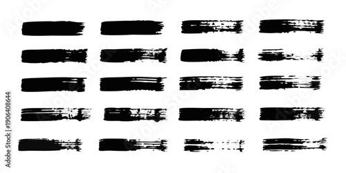 Abstract arrangement of black brush strokes on a white background
