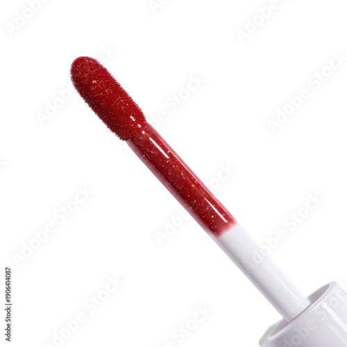 A close-up of a red lip gloss applicator on transparent background