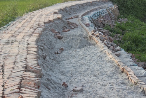 Wallpaper Mural Rural brick path with sand and broken bricks Torontodigital.ca