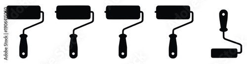 Paint Roller Arrangement: A collection of paint rollers meticulously arranged, illustrating the tools used in painting and the art of home improvement.