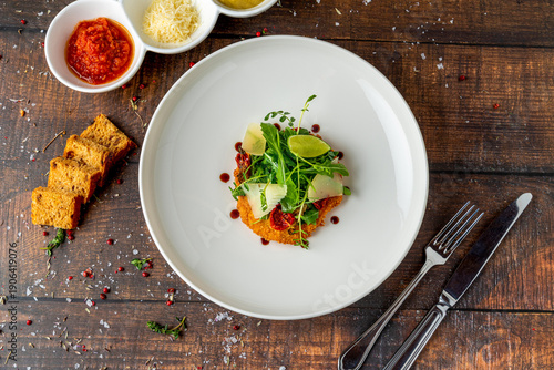 Wallpaper Mural Breaded veal cutlet served with herbs and cheese on plate Torontodigital.ca