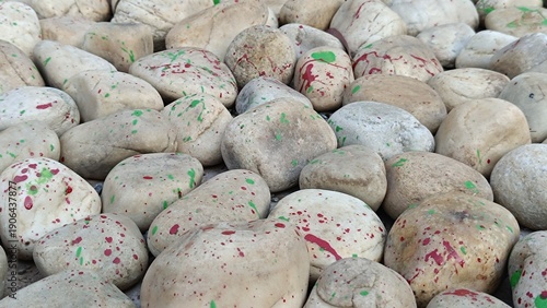 Texture of large smooth stones decoratively laid out on the ground