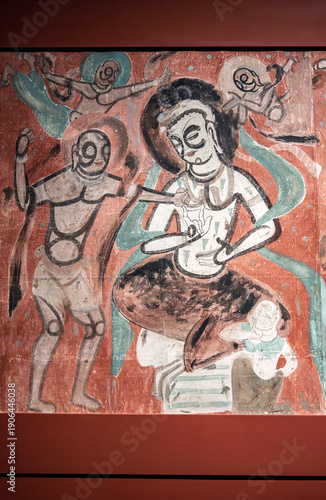 Ancient Buddhist graffiti murals in the Dunhuang Caves of China