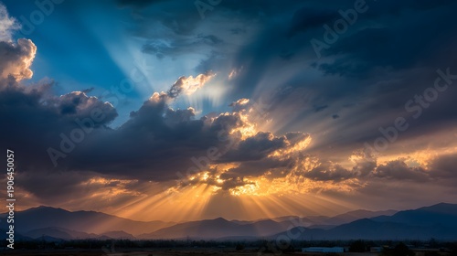 Wallpaper Mural Dramatic Sunset Sky with Golden Sun Rays Breaking Through Dark Clouds Over Mountains. Torontodigital.ca