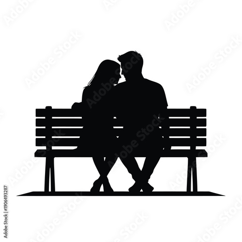Silhouette of a Couple Sitting on a Park Bench