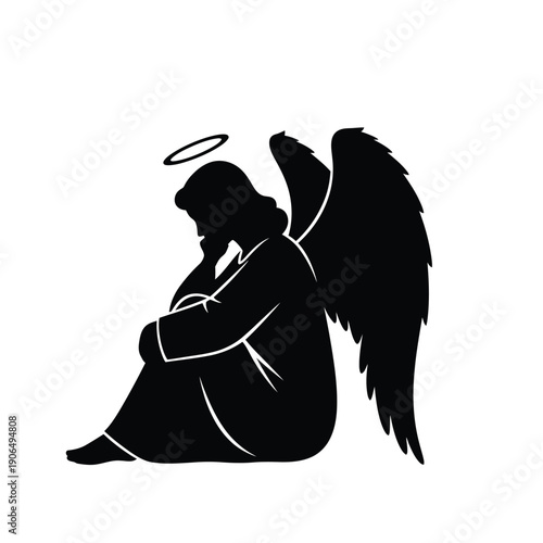 Silhouette of a pensive angel with wings and halo thoughtful