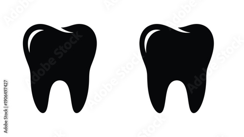 Two black tooth shapes against white background a striking silhouette