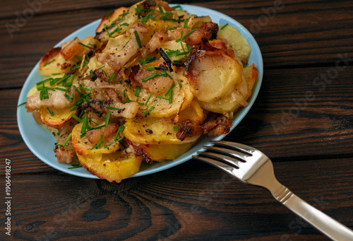 Schilderij op canvas fresh natural fried potatoes with lard and green onions