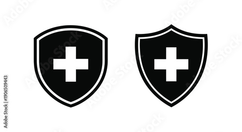 Two black shields with white crosses a striking graphic silhouette