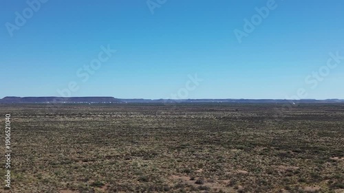 Square Kilometer Array radio telescopes from a distance in the Karoo, South Africa. 4K aerial Video.