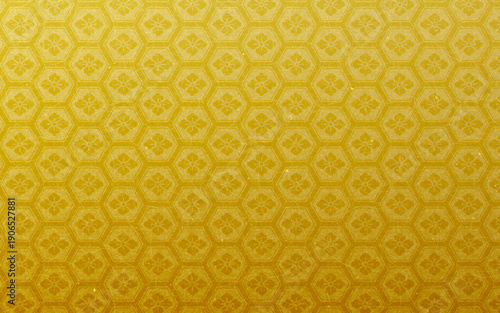 シームレスなゴールド和柄パターン。亀甲花菱模様。