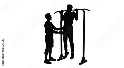 Silhouette of a man assisting another with a pull up on a fitness frame