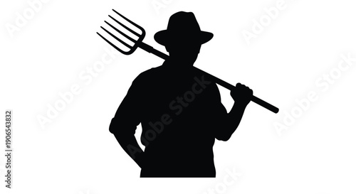 Silhouette of a farmer carrying a pitchfork over his shoulder