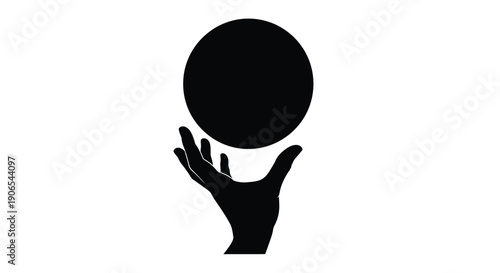 A black silhouette of a hand holding a dark circular object