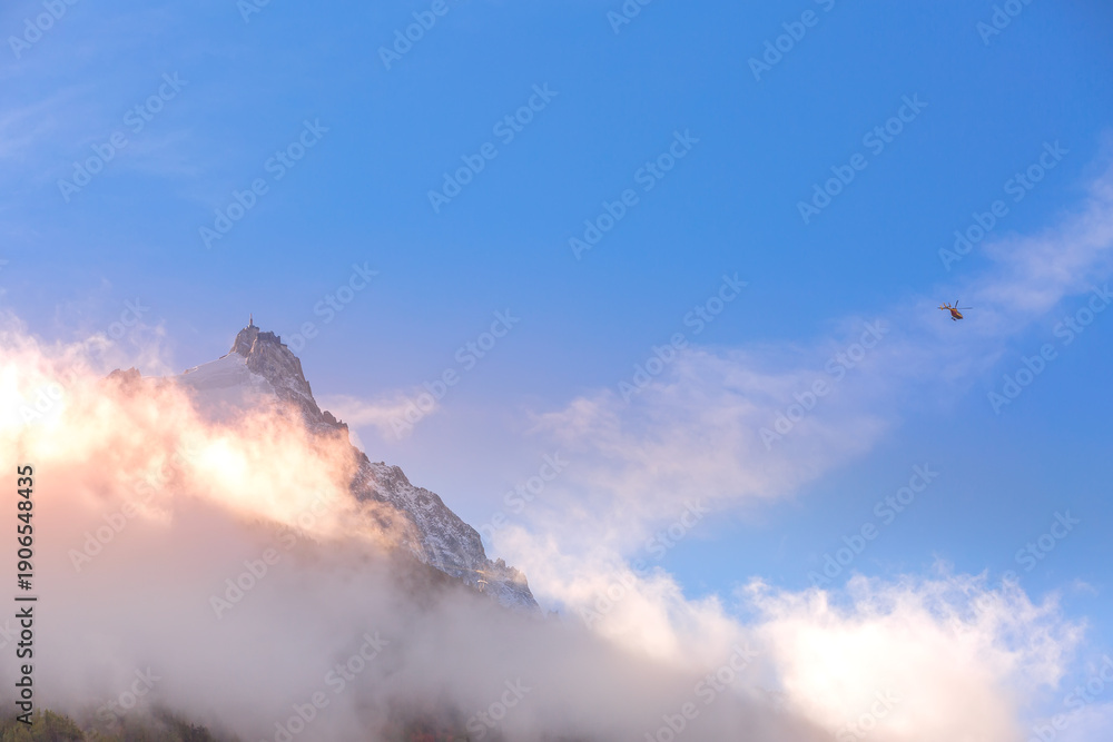 Obraz premium Aiguille du Midi and helicopter in French Alps