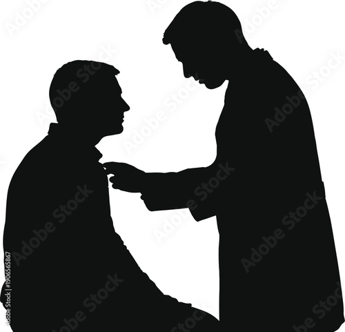 Silhouette of a priest or pastor giving communion or a blessing to a kneeling man in a moment of spiritual guidance and support