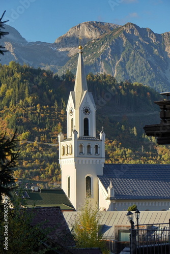Schladming,  alpine town, Austria with Dachshtein mountains in background during fall.
