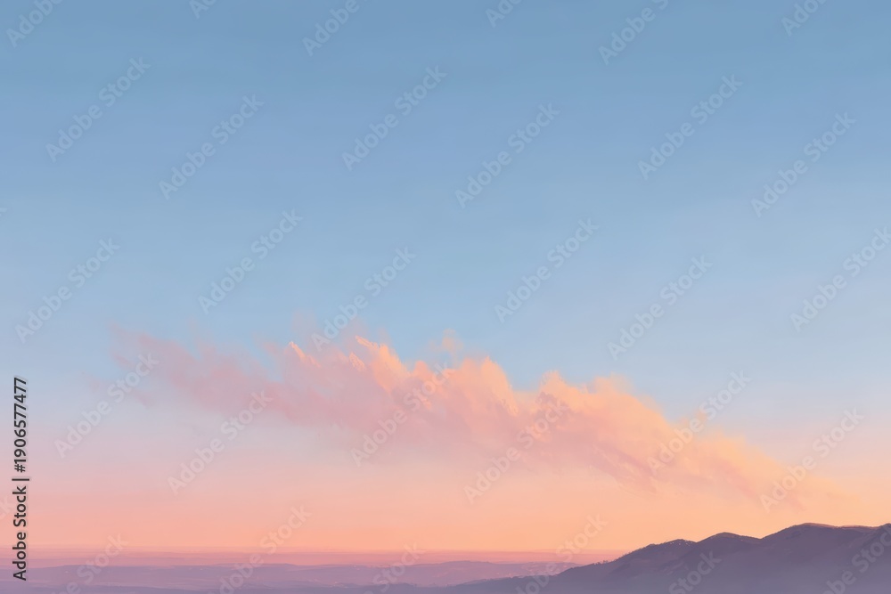 Fototapeta premium A mountain range with a pink sky