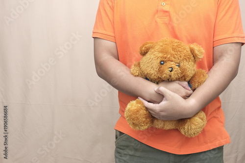 Фотография Person hugging teddy bear with copy space