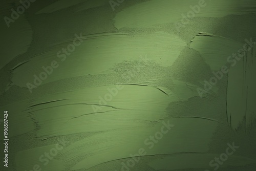 a textured green painted wall surface