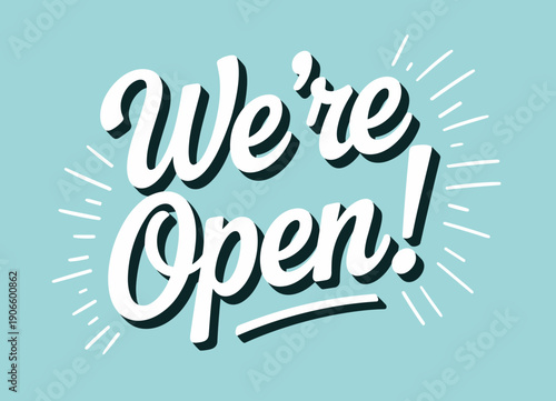 We’re Open hand lettered sign on blue background