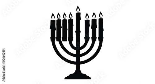 A black silhouette of a traditional nine branched hanukkah menorah