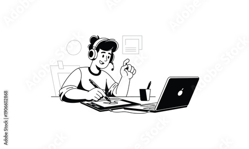 Creative artist working on digital drawing tablet with laptop screen