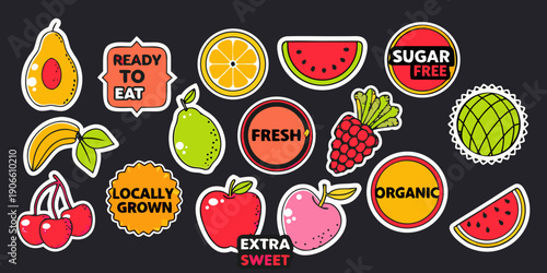 Colorful fruit stickers with labels indicating freshness and organic qualities
