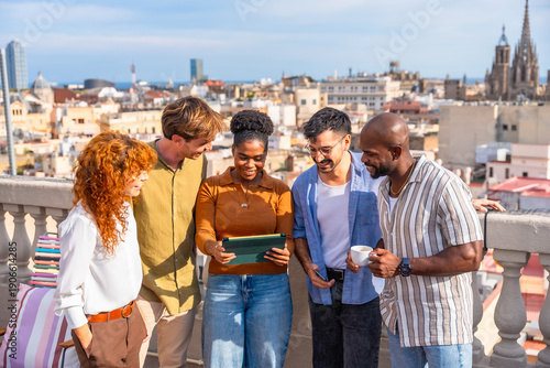 Photography Diverse colleagues having a break, discussing work on barcelona rooftop