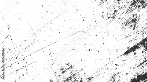 Black ink splatters and scratches on a white textured background abstract