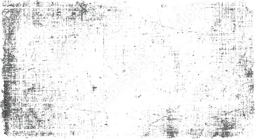 Grungy distressed texture with dark grey speckles and lines on white background grunge